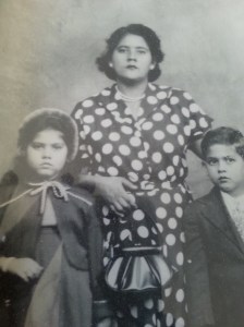 Grandma Candita (center), my Father (right), my Aunt Lucy (left)